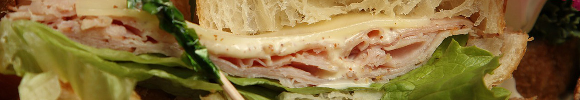 Eating Diner Sandwich at A & J Sub Shop.